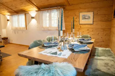 Ein Sitzbereich in der Unterkunft Chalet Santa Maria