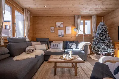 Ein Sitzbereich in der Unterkunft Krone Apartment