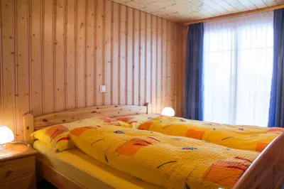 Ein Bett oder Betten in einem Zimmer der Unterkunft Chalet Wurzenbord 1