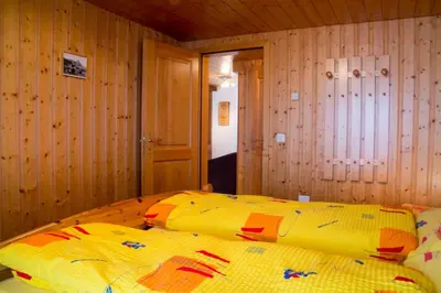 Ein Bett oder Betten in einem Zimmer der Unterkunft Chalet Wurzenbord 1