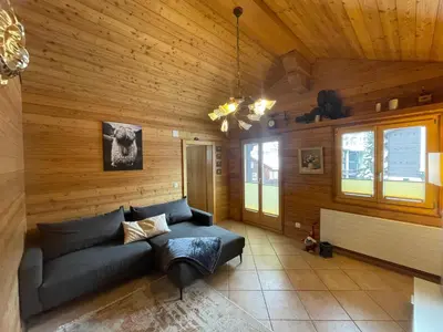 Ein Sitzbereich in der Unterkunft Apartment Chalet Diana