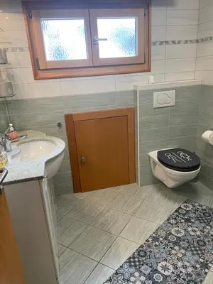 Ein Badezimmer in der Unterkunft Apartment Chalet Diana