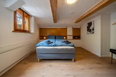 Ein Bett oder Betten in einem Zimmer der Unterkunft Large apt in town center next to Brunngasse & near lake
