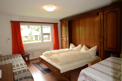 Ein Bett oder Betten in einem Zimmer der Unterkunft Haus Richemont