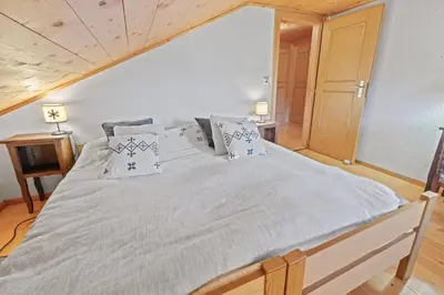 Ein Bett oder Betten in einem Zimmer der Unterkunft Montana Village - appartement rénové, 5 pers