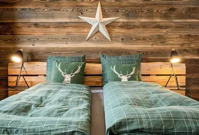 Ein Bett oder Betten in einem Zimmer der Unterkunft Chalet Halten