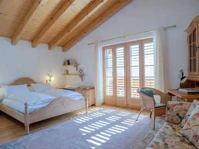 Ein Bett oder Betten in einem Zimmer der Unterkunft Orion - Luxuriöse Duplex Wohnung in Grindelwald