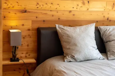 Ein Bett oder Betten in einem Zimmer der Unterkunft Le Bouquetin l Ski-out l Sauna