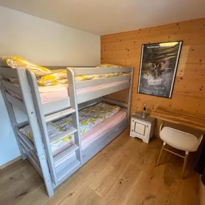 Ein Bett oder Betten in einem Zimmer der Unterkunft Chalet La Lumiere by Alte Bock