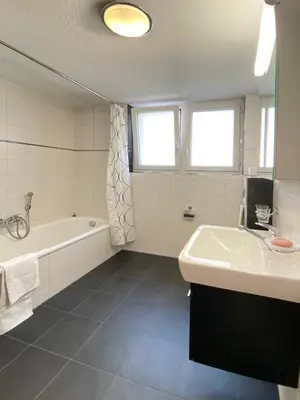 Ein Badezimmer in der Unterkunft Apartment Aragon Matterhornview 100m2