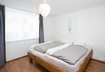 Ein Bett oder Betten in einem Zimmer der Unterkunft Apartment Aragon Matterhornview 100m2