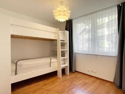 Ein Bett oder Betten in einem Zimmer der Unterkunft Apartment Aragon Matterhornview 100m2