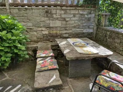 Ein Patio oder anderer Außenbereich in der Unterkunft Rustico La Rocca by Fewotessin