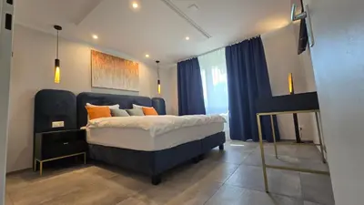 Ein Bett oder Betten in einem Zimmer der Unterkunft Apartment BugerStay