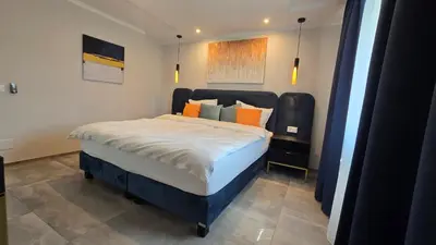 Ein Bett oder Betten in einem Zimmer der Unterkunft Apartment BugerStay