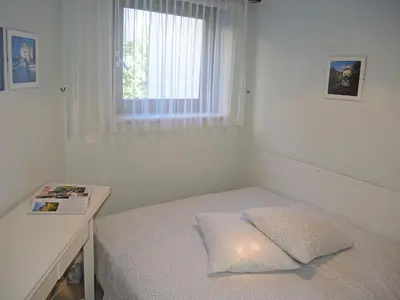 Ein Bett oder Betten in einem Zimmer der Unterkunft Moira by Fewotessin