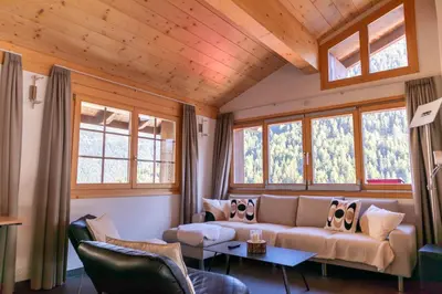 Ein Sitzbereich in der Unterkunft ESCAPE Chalets