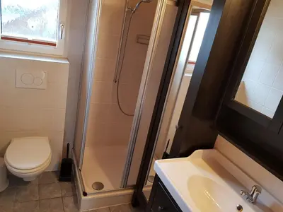 Ein Badezimmer in der Unterkunft Ferienwohnung EnFiNi