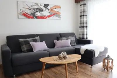 Ein Sitzbereich in der Unterkunft Ferienhaus Alea