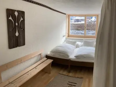 Ein Bett oder Betten in einem Zimmer der Unterkunft Chalet Wasserfall 3-Zimmerferienwohnung möbliert