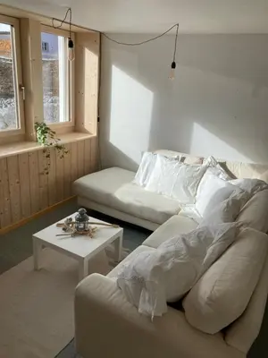 Ein Sitzbereich in der Unterkunft Chalet Wasserfall 3-Zimmerferienwohnung möbliert