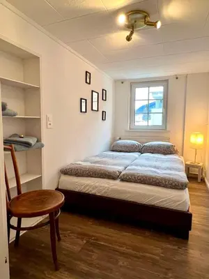 Ein Bett oder Betten in einem Zimmer der Unterkunft Chalet im Wallis