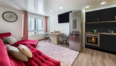 Ein Sitzbereich in der Unterkunft Apartment Kandahar 42