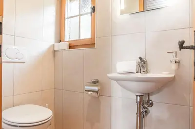 Ein Badezimmer in der Unterkunft Chalet Heimat