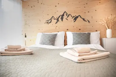 Ein Bett oder Betten in einem Zimmer der Unterkunft apartment2lakes Matten bei Interlaken