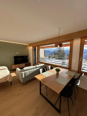 Ein Sitzbereich in der Unterkunft Studio moderne et cosy avec piscine et sauna