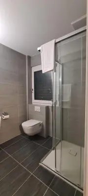 Ein Badezimmer in der Unterkunft Hotel Garni