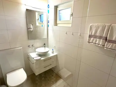 Ein Badezimmer in der Unterkunft Concierge with Scenic Views and Long Stay by SwissHut