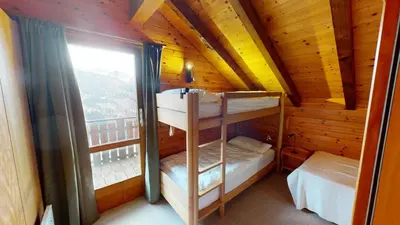 Ein Bett oder Betten in einem Zimmer der Unterkunft Tschuggen TU78