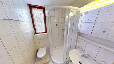 Ein Badezimmer in der Unterkunft Tschuggen TU78
