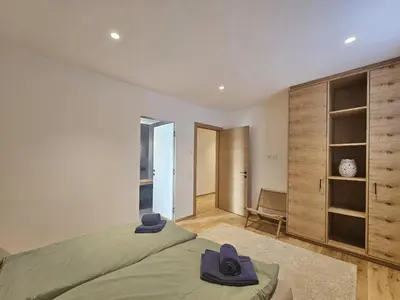 Ein Bett oder Betten in einem Zimmer der Unterkunft Silberdistel EG