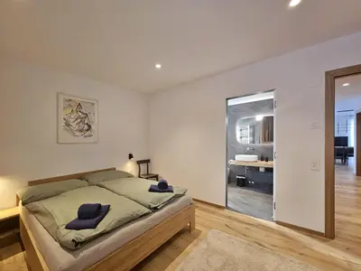 Ein Bett oder Betten in einem Zimmer der Unterkunft Silberdistel EG