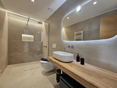 Ein Badezimmer in der Unterkunft Silberdistel EG