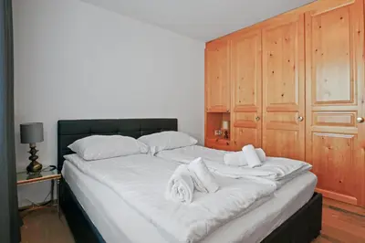 Ein Bett oder Betten in einem Zimmer der Unterkunft Magnifique appartement au centre de Crans-Montana