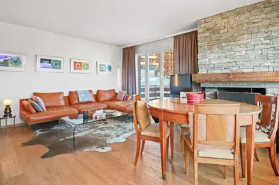Ein Sitzbereich in der Unterkunft Magnifique appartement au centre de Crans-Montana