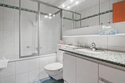 Ein Badezimmer in der Unterkunft Magnifique appartement au centre de Crans-Montana