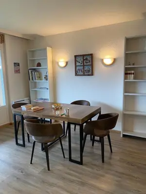 Ein Sitzbereich in der Unterkunft Magnifique appartement avec vue sur les sommets enneigés