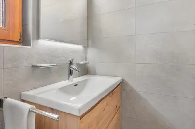 Ein Badezimmer in der Unterkunft Appartement ski aux pieds - domaine des 4 Vallées