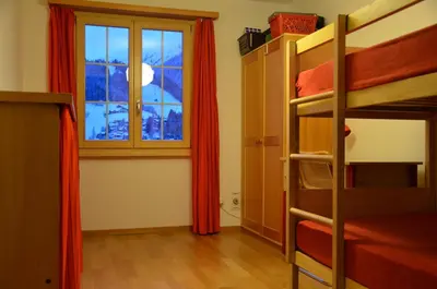 Ein Bett oder Betten in einem Zimmer der Unterkunft Chalet Wandelgrün