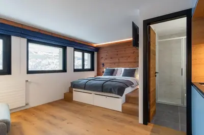 Ein Bett oder Betten in einem Zimmer der Unterkunft Studio Les Bouleaux - 1 lit - 3 pers
