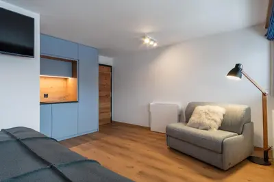 Ein Sitzbereich in der Unterkunft Studio Les Bouleaux - 1 lit - 3 pers