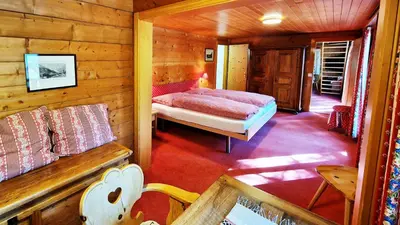 Ein Bett oder Betten in einem Zimmer der Unterkunft Chalet La Sapinière