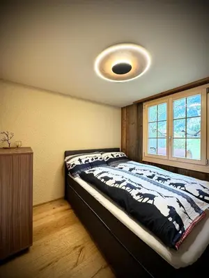 Ein Bett oder Betten in einem Zimmer der Unterkunft Chalet Monjeri, modern und einzigartig