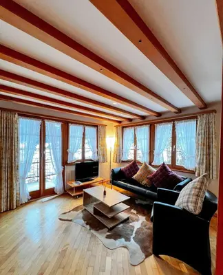 Ein Sitzbereich in der Unterkunft Apartment Aphrodite West magnificent Eiger view