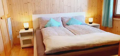 Ein Bett oder Betten in einem Zimmer der Unterkunft JuKa