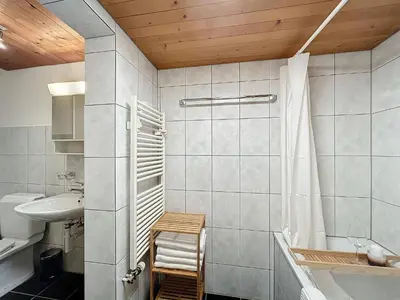 Ein Badezimmer in der Unterkunft Appartement Wengen - Charme Alpin